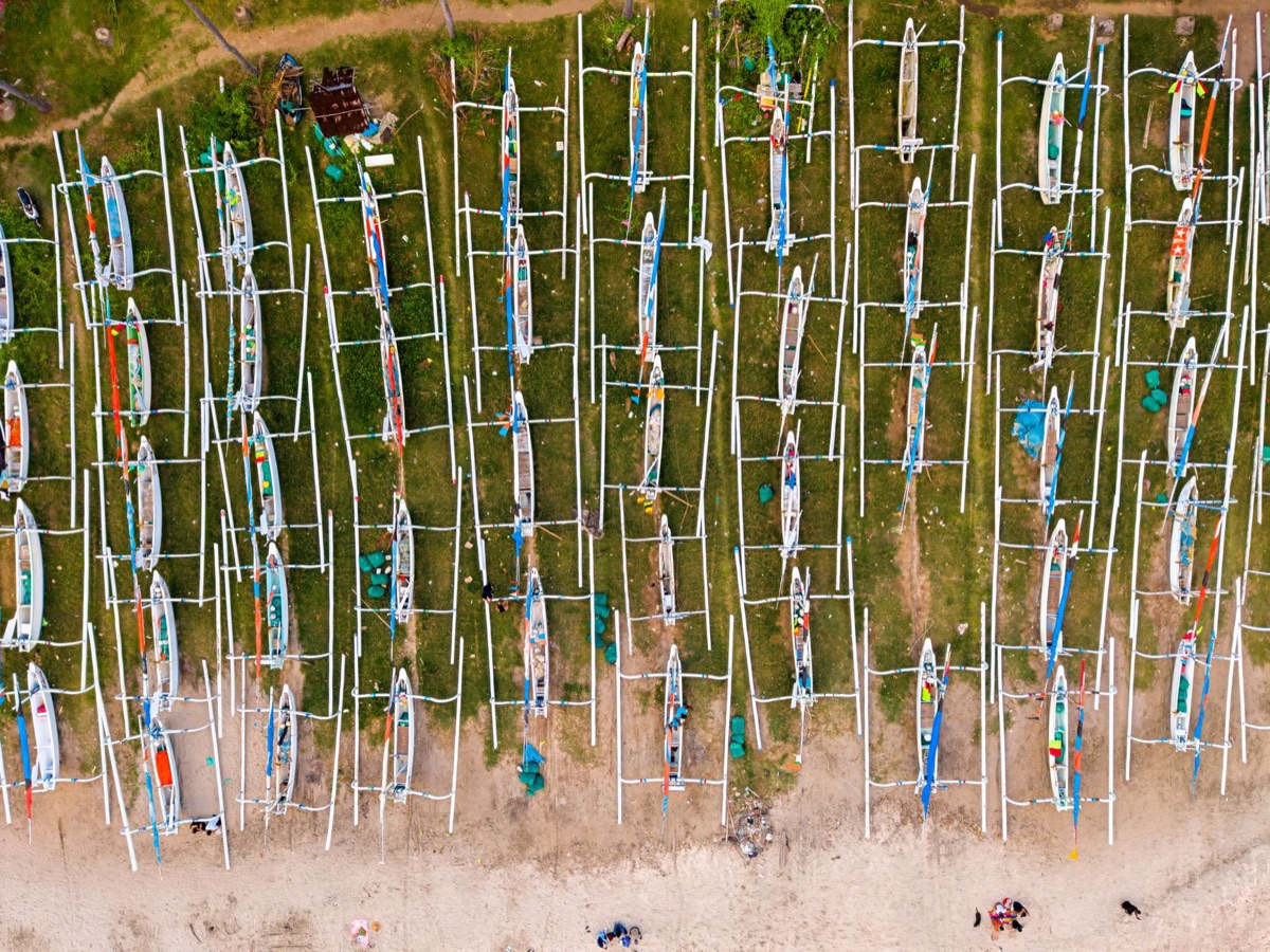 Fiji village with traditional tanoa canoe
