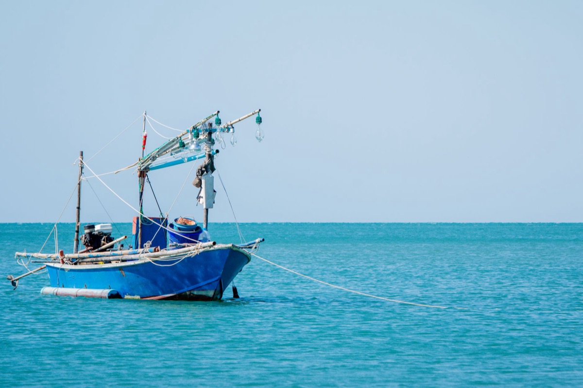 Fishing boat with anchor