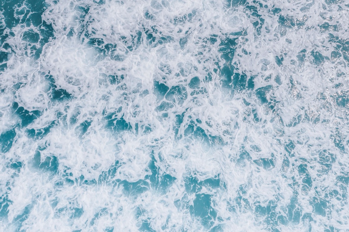 Blue wave with white foam