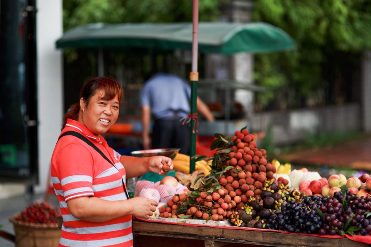 tropical fruit vendor at market