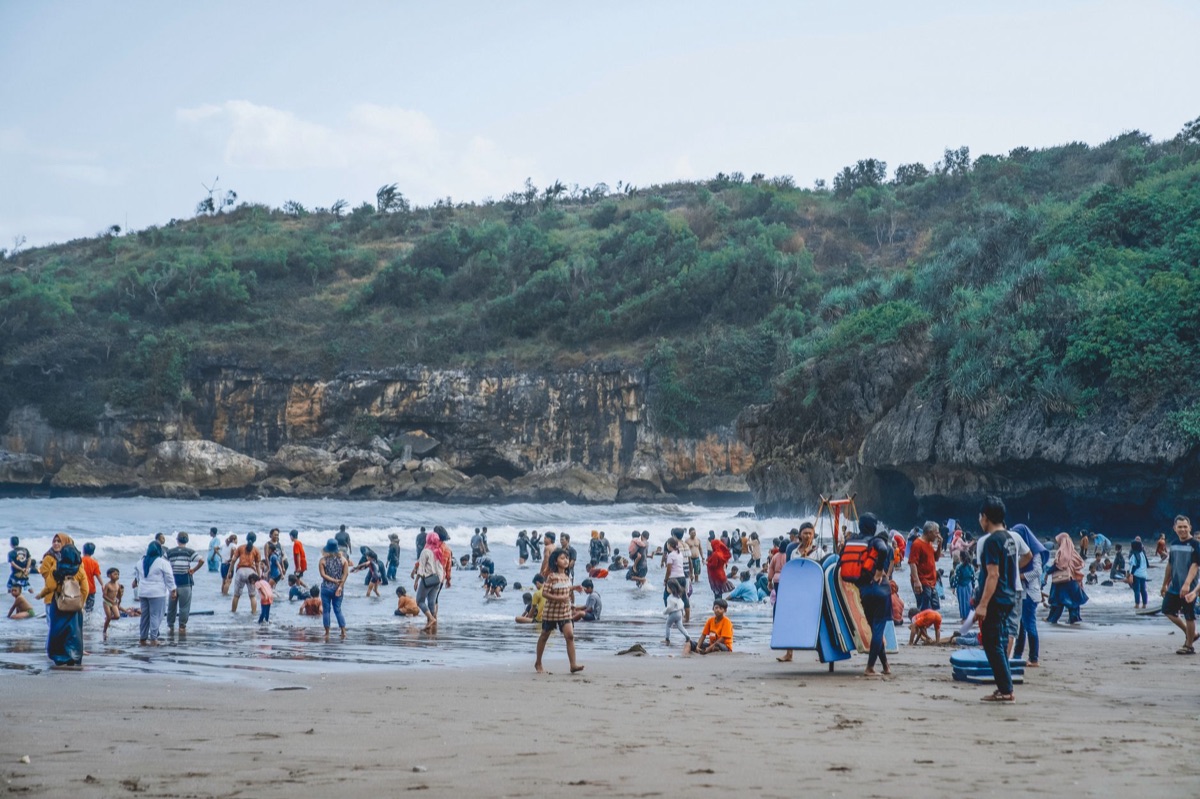 local family gathering on beach